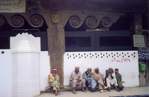 Unfortunately I was chased away by an irate worshiper when I tried to get more photos of this mosque but the four pillars like the one pictured, held up a beam made of a single piece that was at least 30 metres long & a few hundred years old, inside- three more of equal length.