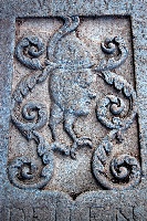 in the ruins of an ancient Portuguese church this strange lapidary design on a tomb in the floor among others with ordinary coats of arms. It reminds me of Hieronomous Bosch's work 195