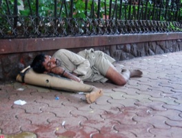 A man sleeping on his orthopaedic leg