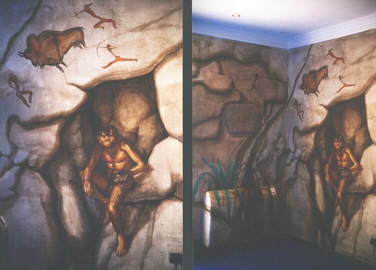 Mural: Two details of a larger mural covering two adjacent walls. Just visible in the photo to the right, above the air conditioner, is a piece of stone carved by Neolithic man, another graced the wall to the left of the French doors. So we came up with the idea of painting the room like a cave with the primitive painter holding a palette & brush.