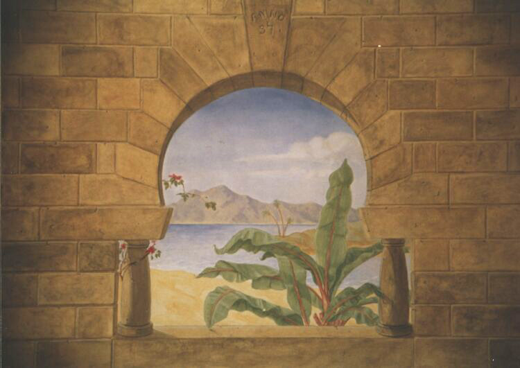 Mural: Wall painted like stone with a view of the sea.