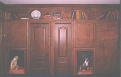 One of three walls of hand-painted wood paneling designed to match the oaken doors, which are the only things made of wood in the image.