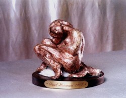 Sculpture: Clay figure with silver leaf & oil paint polychroming, 18 cm (7 in) tall.